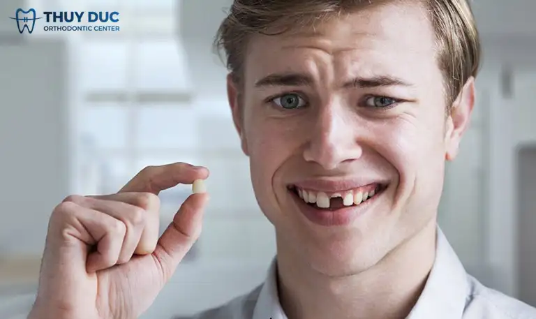 nằm mơ thấy rụng răng hên hay xui